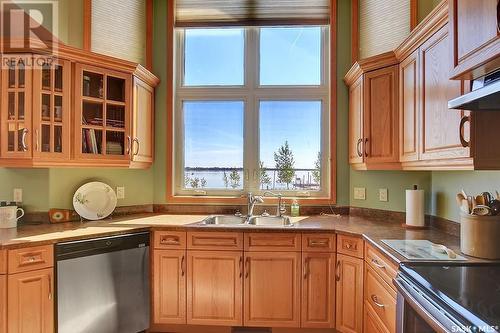 400 Lakeshore Drive, Wee Too Beach, SK - Indoor Photo Showing Kitchen With Double Sink