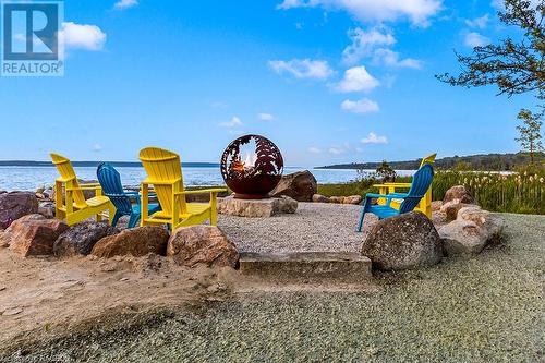 Shared Fire Pit - 535 Isaac Street Unit# 203, South Bruce Peninsula, ON - Outdoor With Body Of Water With View