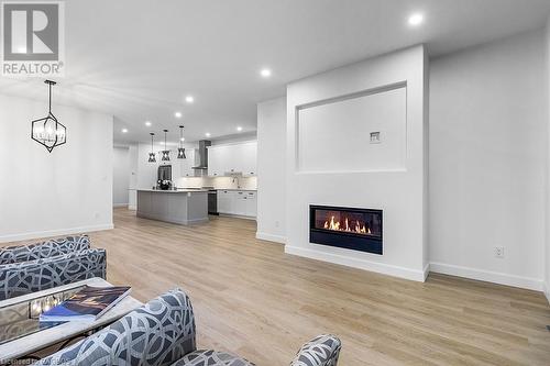 535 Isaac Street Unit# 203, South Bruce Peninsula, ON - Indoor Photo Showing Living Room With Fireplace