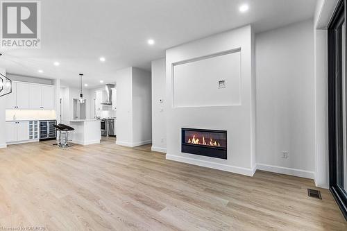 535 Isaac Street Unit# 202, South Bruce Peninsula, ON - Indoor Photo Showing Living Room With Fireplace