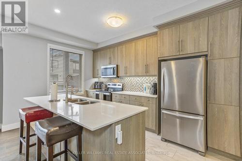 16 - 177 Edgevalley Road, London, ON - Indoor Photo Showing Kitchen With Double Sink With Upgraded Kitchen