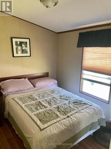 118 - 1802 County Rd 121, Kawartha Lakes, ON - Indoor Photo Showing Bedroom