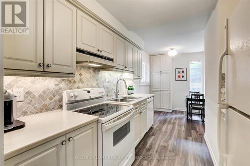 78 - 20 Mineola Road E, Mississauga, ON - Indoor Photo Showing Kitchen With Double Sink