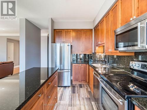 310 - 70 Port Street E, Mississauga (Port Credit), ON - Indoor Photo Showing Kitchen With Double Sink