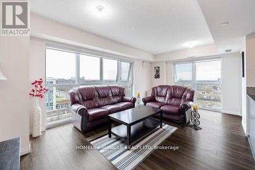 1002 - 2152 Lawrence Avenue E, Toronto, ON - Indoor Photo Showing Living Room