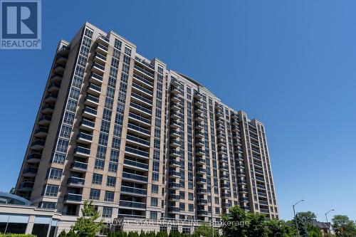 1316 - 8 Mondeo Drive, Toronto, ON - Outdoor With Balcony With Facade