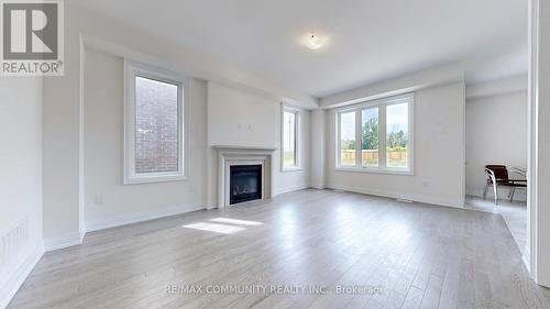 103 Hoad Street, Clarington, ON - Indoor Photo Showing Living Room With Fireplace