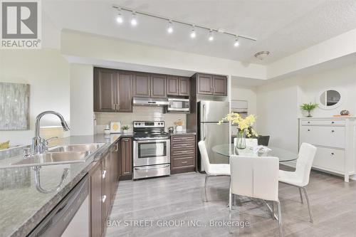 317 - 89 South Town Centre Boulevard, Markham, ON - Indoor Photo Showing Kitchen With Double Sink
