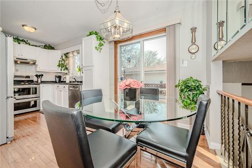 Eat-in Kitchen with access to Deck, perfect for the summer BBQ! - 4101 Marcia Place, Burlington, ON - Indoor Photo Showing Dining Room