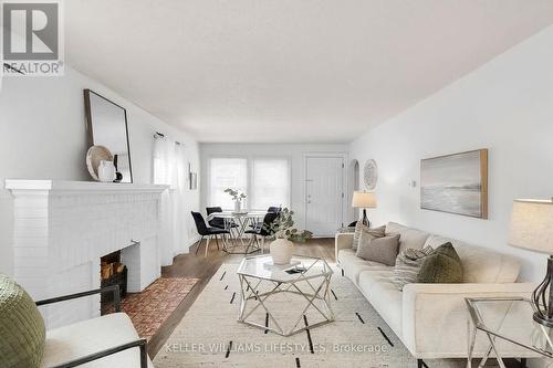 10 Briscoe Street W, London, ON - Indoor Photo Showing Living Room With Fireplace