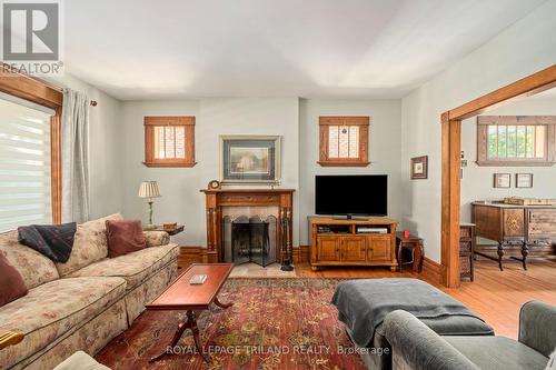 242 Ridout Street S, London, ON - Indoor Photo Showing Living Room With Fireplace
