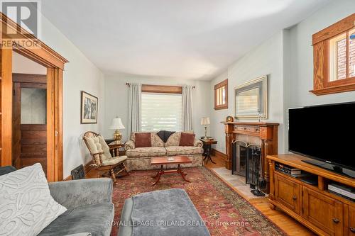 242 Ridout Street S, London, ON - Indoor Photo Showing Living Room With Fireplace