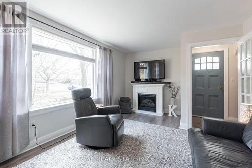 7054 Beattie Street, London, ON - Indoor Photo Showing Living Room With Fireplace