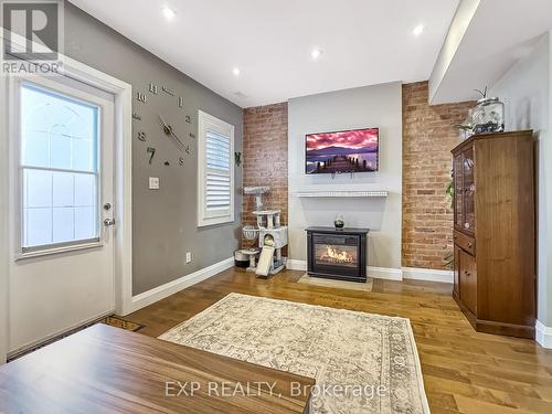 3224 Steeles Avenue W, Milton, ON - Indoor Photo Showing Living Room With Fireplace