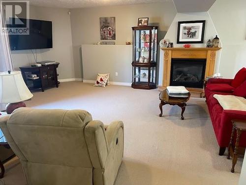 4156 Mirage, Greater Sudbury, ON - Indoor Photo Showing Living Room With Fireplace