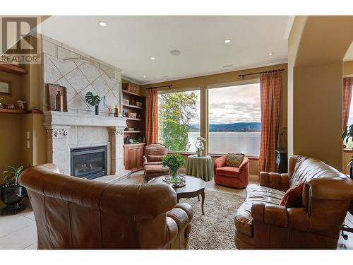 683 Westside Road S, West Kelowna, BC - Indoor Photo Showing Living Room With Fireplace