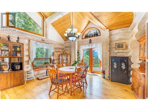 1958 Rykerts Road, Lister, BC - Indoor Photo Showing Dining Room With Fireplace