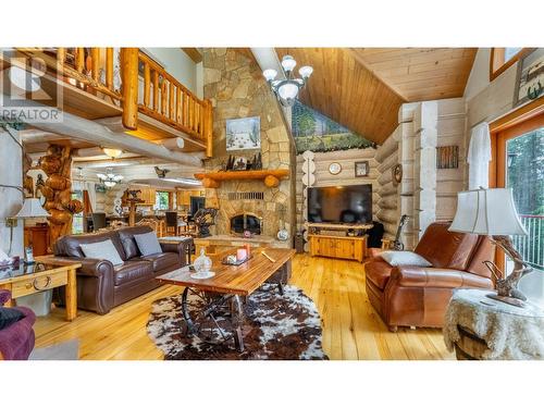 1958 Rykerts Road, Lister, BC - Indoor Photo Showing Living Room With Fireplace