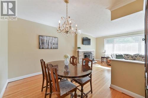 50 Silverhill Drive, Toronto, ON - Indoor Photo Showing Dining Room With Fireplace