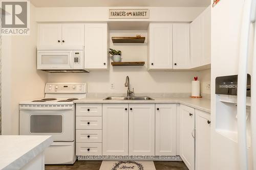 12 Chaucer Crescent, Barrie, ON - Indoor Photo Showing Kitchen With Double Sink