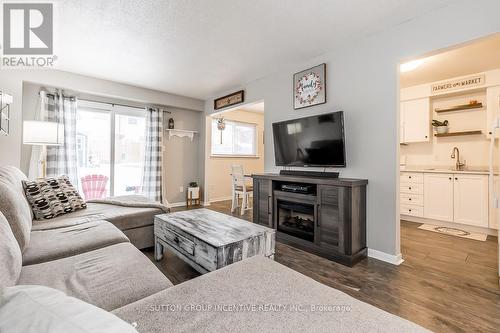 12 Chaucer Crescent, Barrie, ON - Indoor Photo Showing Living Room With Fireplace