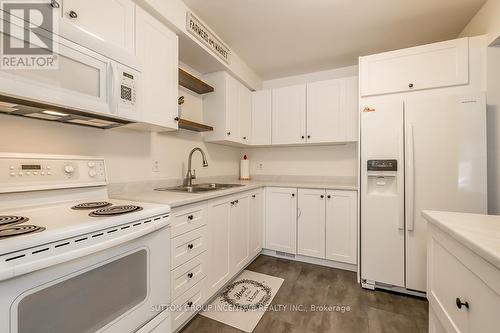 12 Chaucer Crescent, Barrie, ON - Indoor Photo Showing Kitchen With Double Sink