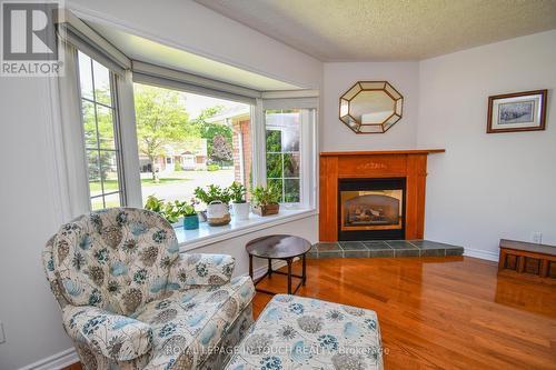 17 - 90 Burke Street E, Penetanguishene, ON - Indoor Photo Showing Living Room With Fireplace