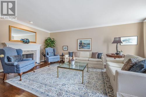 24 Mcglashan Court, Toronto, ON - Indoor Photo Showing Living Room With Fireplace