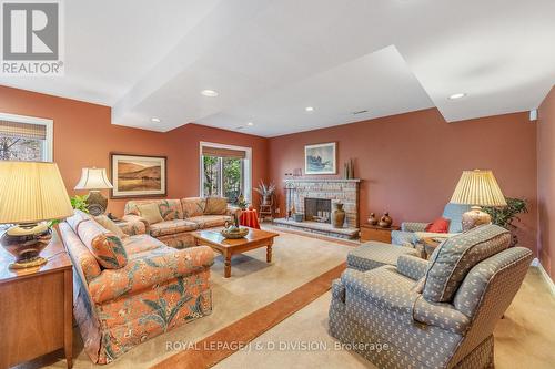 24 Mcglashan Court, Toronto, ON - Indoor Photo Showing Living Room With Fireplace