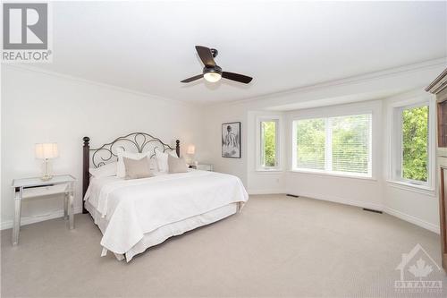 Primary bedroom with large windows - 37 Slade Crescent, Ottawa, ON - Indoor Photo Showing Bedroom