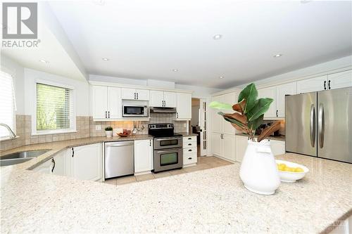 Entertaining from this gorgeous kitchen is an absolute pleasure! - 37 Slade Crescent, Ottawa, ON - Indoor Photo Showing Kitchen With Double Sink