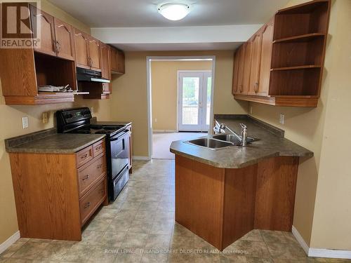 61 - 1535 Trossacks Avenue, London, ON - Indoor Photo Showing Kitchen With Double Sink