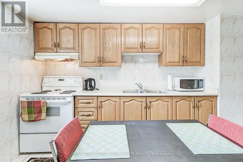 176 Mcgill Street, Mississauga, ON - Indoor Photo Showing Kitchen With Double Sink