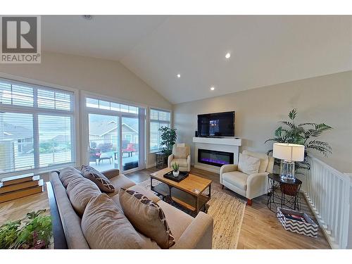 2450 Radio Tower Road Unit# 209, Oliver, BC - Indoor Photo Showing Living Room With Fireplace