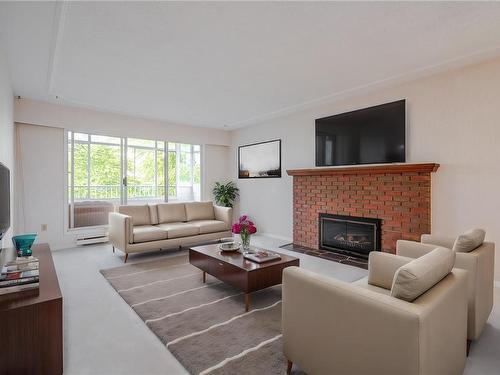 302-545 Rithet St, Victoria, BC - Indoor Photo Showing Living Room With Fireplace