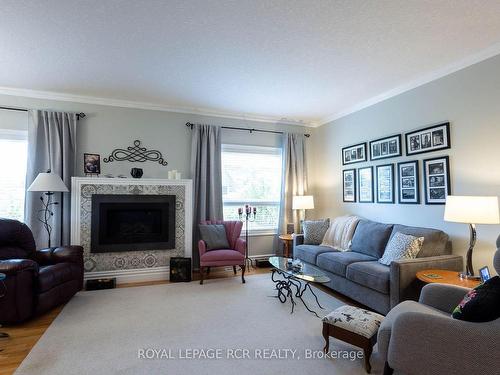 300 Mccord St, Wellington North, ON - Indoor Photo Showing Living Room With Fireplace