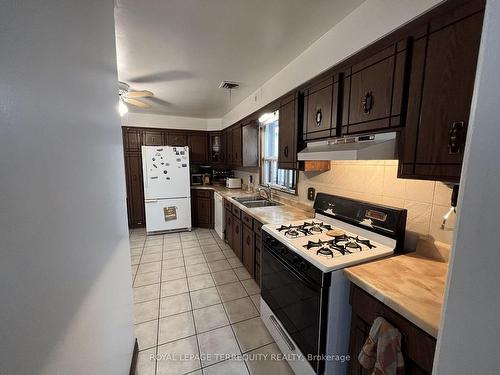 119 Regina Ave, Toronto, ON - Indoor Photo Showing Kitchen With Double Sink