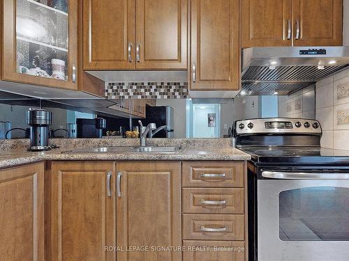 709-155 Hillcrest Ave, Mississauga, ON - Indoor Photo Showing Kitchen With Double Sink