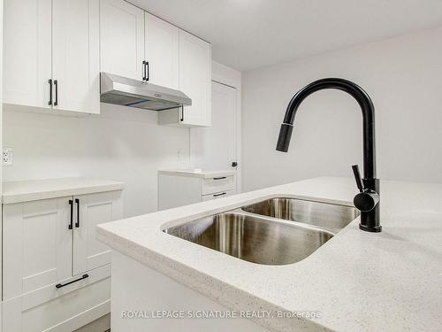 8-6701 Thorold Stone Rd, Niagara Falls, ON - Indoor Photo Showing Kitchen With Double Sink