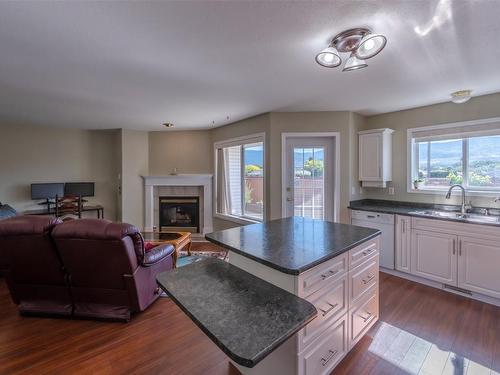 506 Red Wing Drive, Penticton, BC - Indoor With Fireplace
