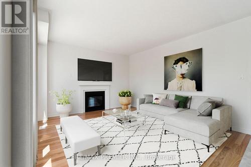 52 Baycroft Boulevard, Essa, ON - Indoor Photo Showing Living Room With Fireplace