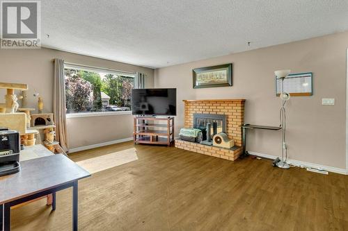2763 Norwood Street, Prince George, BC - Indoor Photo Showing Living Room With Fireplace
