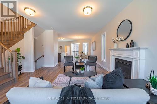 1076 Rippingale Trail, Peterborough, ON - Indoor Photo Showing Living Room With Fireplace