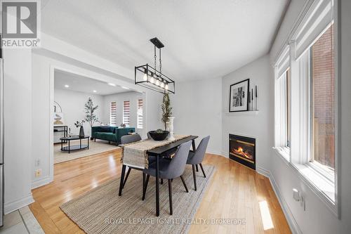 5464 Red Brush Drive, Mississauga, ON - Indoor Photo Showing Dining Room With Fireplace