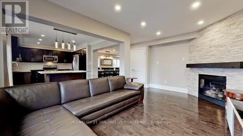 1091 Laurier Avenue, Milton, ON - Indoor Photo Showing Living Room With Fireplace