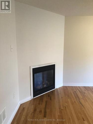 143 Mccready Drive, Milton (Scott), ON - Indoor Photo Showing Living Room With Fireplace