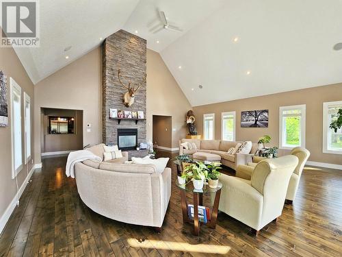 21565 West Lake Road, Prince George, BC - Indoor Photo Showing Living Room With Fireplace