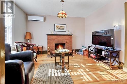 1031 Carling Avenue, Ottawa, ON - Indoor Photo Showing Living Room With Fireplace
