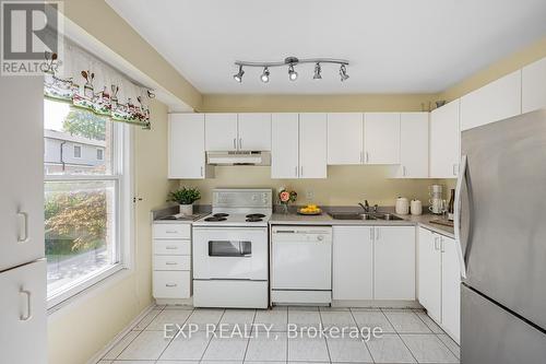 179 - 2440 Bromsgrove Road, Mississauga, ON - Indoor Photo Showing Kitchen With Double Sink