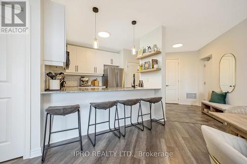 310 - 383 Main Street E, Milton, ON - Indoor Photo Showing Kitchen With Upgraded Kitchen